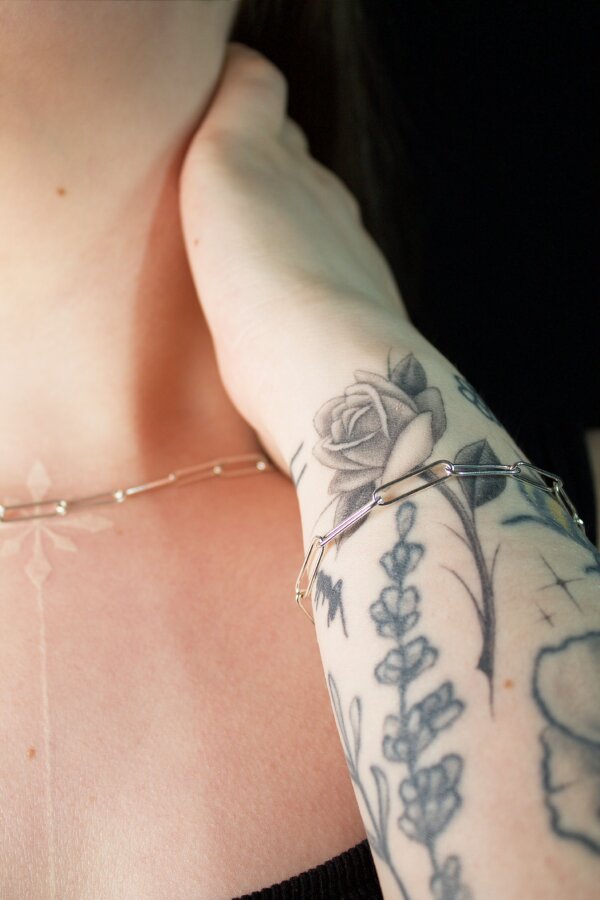 CORN Armkette Nahaufnahme von einer Armkette aus Silber